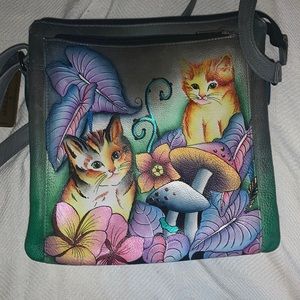 Lightly used anuschka handbag. Excellent condition.